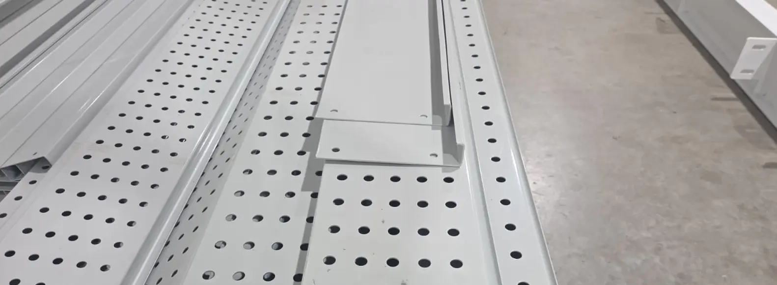Perforated steel decking for a custom mezzanine floor system