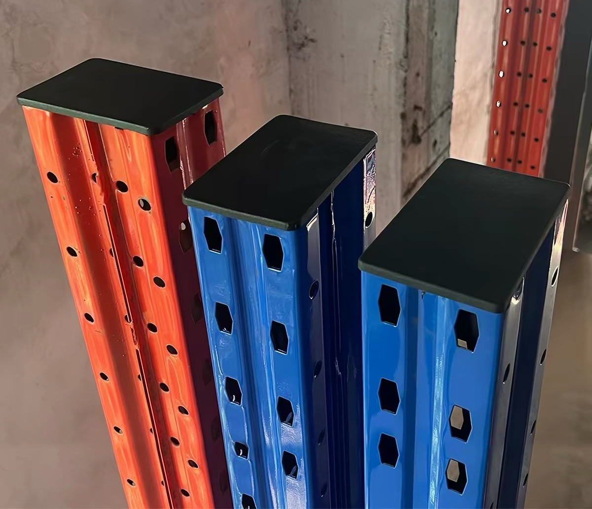 plastic protective end caps installed on pallet racking upright columns for warehouse safety
